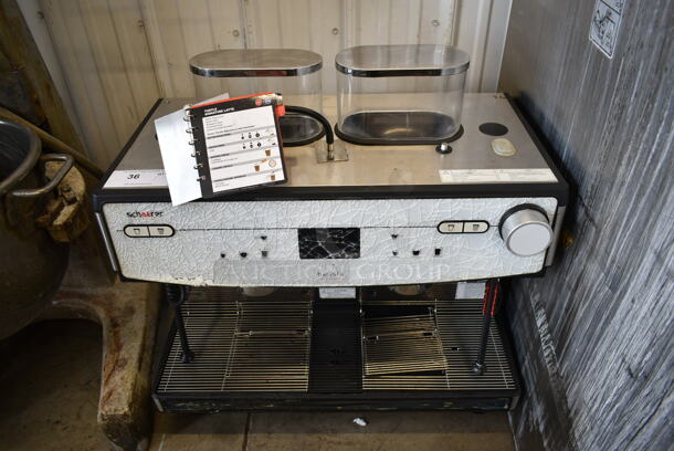 2018 Schaerer Barista Stainless Steel Commercial Countertop 2 Group Espresso Machine w/ 2 Steam Wands and 2 Hoppers. 208/240 Volts, 1 Phase. See Pictures For Cracked Control Panel.