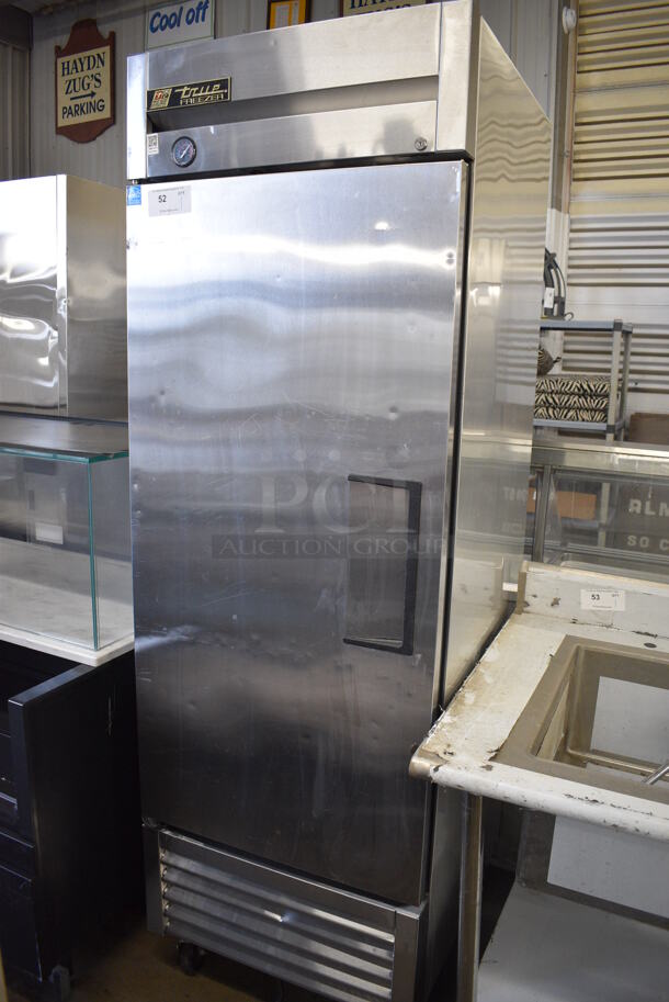 True Model T-23F ENERGY STAR Stainless Steel Commercial Single Door Reach In Freezer w/ Poly Coated Racks on Commercial Casters. 115 Volts, 1 Phase. 27x29x83. Tested and Powers On But Does Not Get Cold