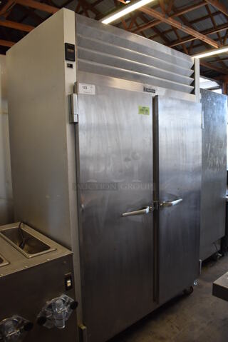 Traulsen G20010 Stainless Steel Commercial 2 Door Reach In Cooler on Commercial Casters. 115 Volts, 1 Phase. 52x34x82. Tested and Working!