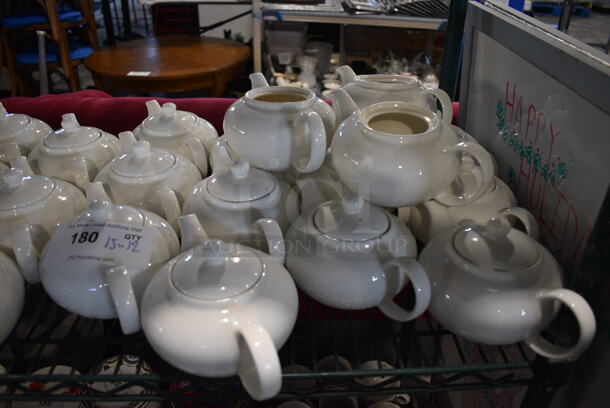 15 White Ceramic Tea Pots. Missing 3 Lids. 9x5.5x4.5. 15 Times Your Bid!