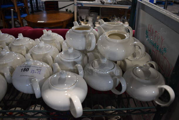 15 White Ceramic Tea Pots. Missing 3 Lids. 9x5.5x4.5. 15 Times Your Bid! - Image 1 of 3
