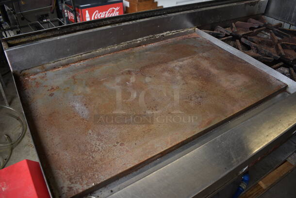 Blodgett Stainless Steel Commercial Natural Gas Powered Flat Top Griddle w/ 4 Burner Range, Gas Hose and Under Shelf on Commercial Casters. One Caster Needs To Be Reattached. 60x31x43 - Image 2 of 6