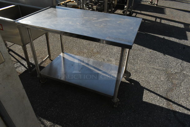 Stainless Steel Table w/ Metal Under Shelf on Commercial Casters. 