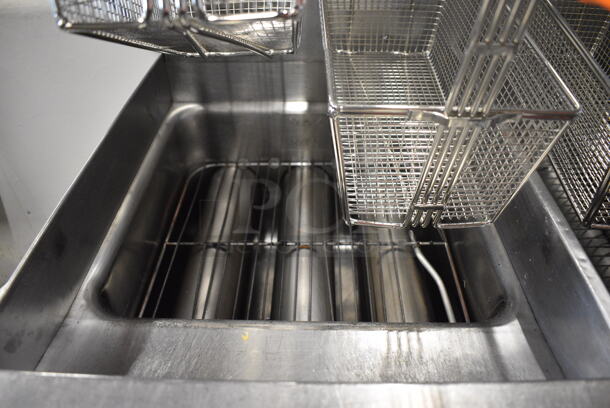 Keating Model 14TFMRI Stainless Steel Commercial Floor Style Natural Gas Powered 3 Bay Instant Recovery Deep Fat Fryer w/ Filtration System and 6 Metal Fry Baskets on Commercial Casters. 46x31.5x55 - Image 12 of 12