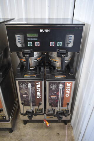 2012 Bunn DUAL SH DBC Stainless Steel Commercial Countertop Coffee Machine w/ Hot Water Dispenser, 2 Satellite Servers and 2 Metal Brew Baskets. 120/240 Volts, 1 Phase.