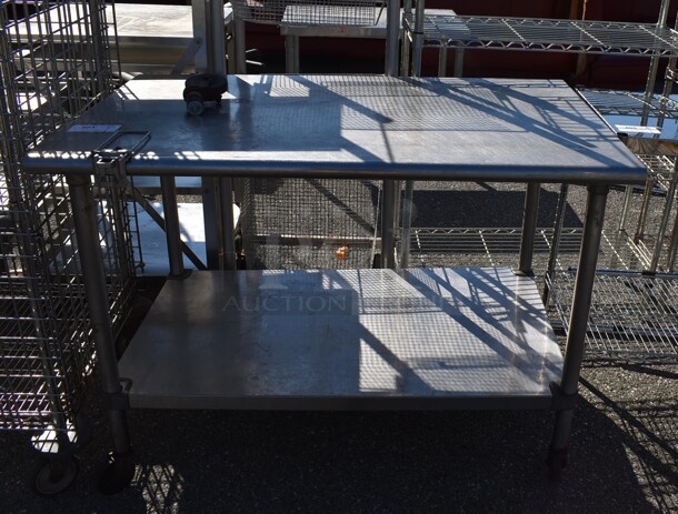 Stainless Steel Table w/ Metal Under Shelf on Commercial Casters. 48x30x35.5