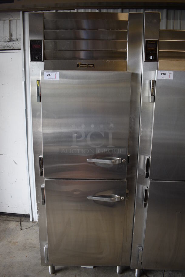 Traulsen Model RDT132WUT Stainless Steel Commercial 2 Half Size Door Reach In Dual Temp Cooler and Freezer Combo. 115 Volts, 1 Phase. 30x34x83. Tested and Powers On; Cooler is Working But Freezer Does Not Get Cold