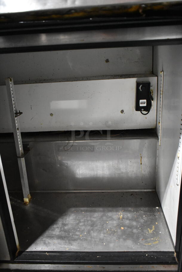 True TSSU-48-12 Stainless Steel Commercial Sandwich Salad Prep Table Bain Marie Mega Top on Commercial Casters. 115 Volts, 1 Phase. Tested and Powers On But Does Not Get Cold
 - Image 5 of 7