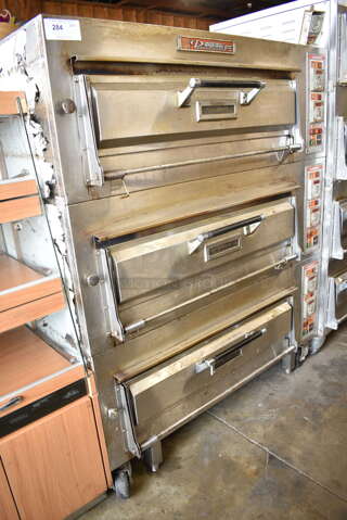 3 Stainless Steel Commercial Electric Powered Single Deck Bakery / Pizza Ovens. Appears To Be 240 Volts, 3 Phase. 3 Times Your Bid!