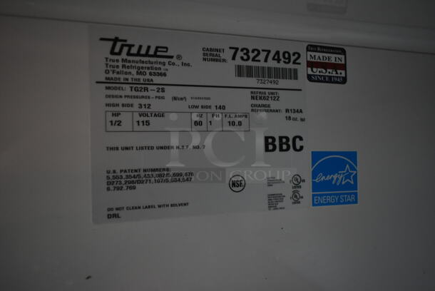 2012 True TG2R-2S ENERGY STAR Stainless Steel Commercial 2 Door Reach In Cooler w/ Poly Coated Racks on Commercial Casters. 115 Volts, 1 Phase. Tested and Working! - Image 5 of 7