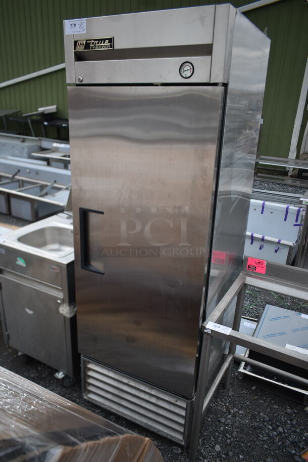 True T-23F Stainless Steel Commercial Single Door Reach In Freezer w/ Poly Coated Racks and Commercial Casters. 115 Volts, 1 Phase. 