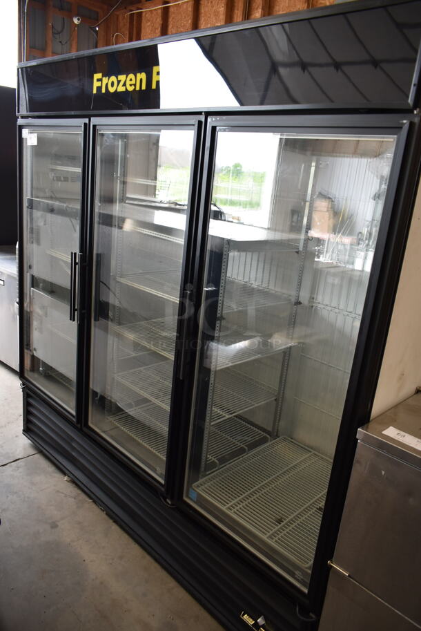 True GDM-72F-LD ENERGY STAR Metal Commercial 3 Door Reach In Freezer Merchandiser w/ Poly Coated Racks. 115/208-230 Volts, 1 Phase.  - Image 1 of 5