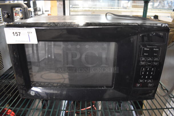 General Electric WES1130DM2BB Metal Countertop Microwave Oven w/ Plate. 120 Volts, 1 Phase. 