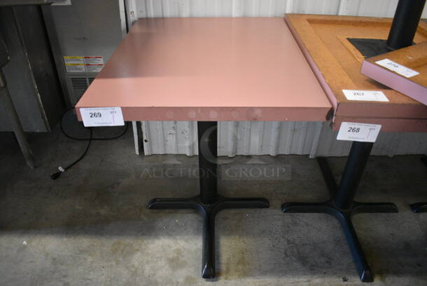 Pink Tabletop on Black Metal Table Base. Stock Picture - Cosmetic Condition May Vary. 24x30x29.5