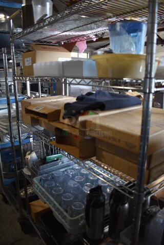 ALL ONE MONEY! Lot of Chrome Finish 5 Tier Shelving Unit on Commercial Casters w/ Contents Including Poly Beverage Tumblers, Coffee Urns, Mesh Baskets, Bus Bins, Utensils and Ceramic Mugs. BUYER MUST DISMANTLE. PCI CANNOT DISMANTLE FOR SHIPPING. PLEASE CONSIDER FREIGHT CHARGES. 48x18x75