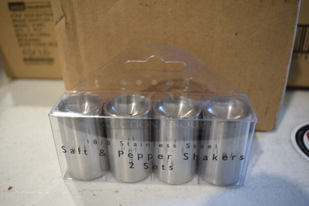 4 BRAND NEW IN BOX! Stainless Steel 4 Piece Salt / Pepper Shakers. 1x1x2. 4 Times Your Bid!