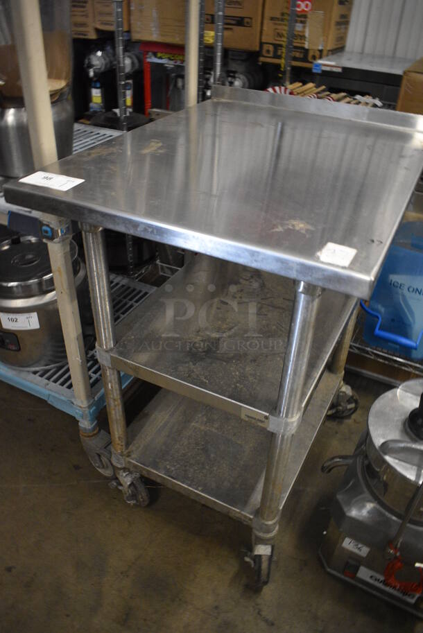 Stainless Steel Table w/ Back Splash and 2 Under Shelves on Commercial Casters. 24x30x37  - Image 2 of 4