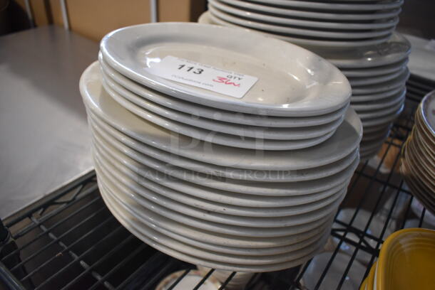 ALL ONE MONEY! Lot of 36 Various White Ceramic Oval Plates. Includes 10x7.5x1 - Image 2 of 3