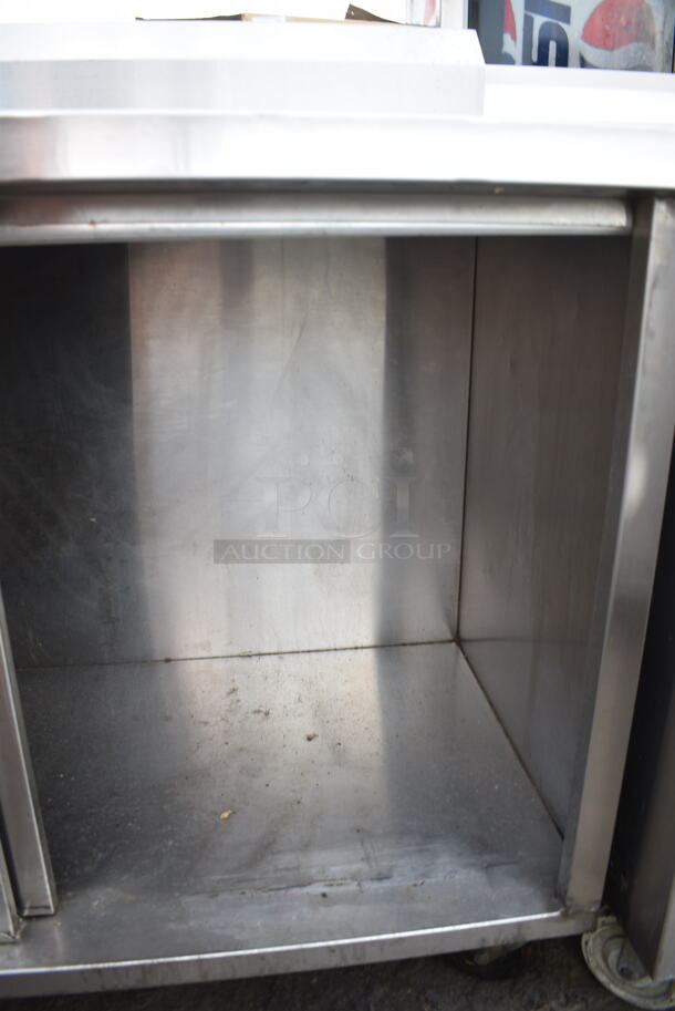 WinHolt Stainless Steel Counter w/ Back Splash, Under Shelf and Doors on Commercial Casters.  - Image 5 of 7