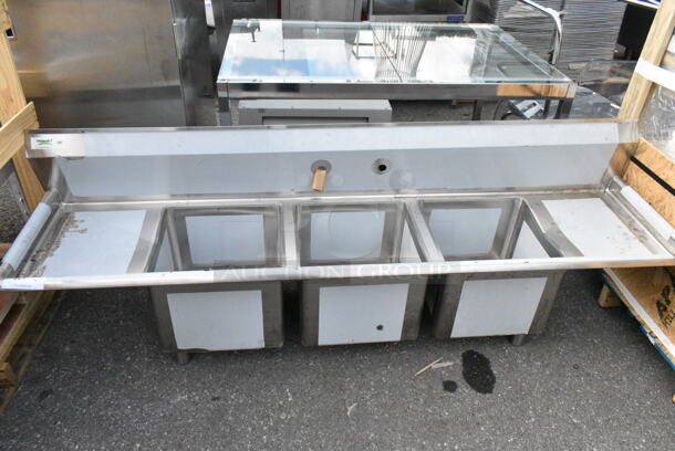 Regency 600S31515215 Stainless Steel Commercial 3 Bay Sink w/ Dual Drain Boards. No Legs. Bays 15x15x12. Drain Boards 13x16 - Image 1 of 8