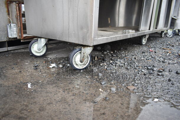 Stainless Steel Commercial Table w/ Back Splash, Under Shelf and 2 Doors on Commercial Casters. - Image 4 of 9