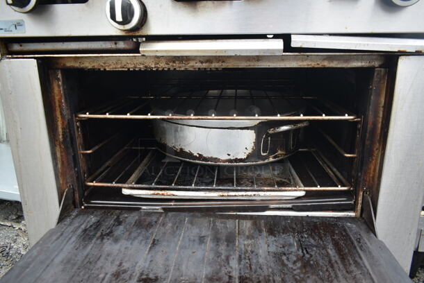Garland G36-6R Stainless Steel Commercial Natural Gas Powered 6 Burner Range w/ Oven and Back Splash.  - Image 6 of 8