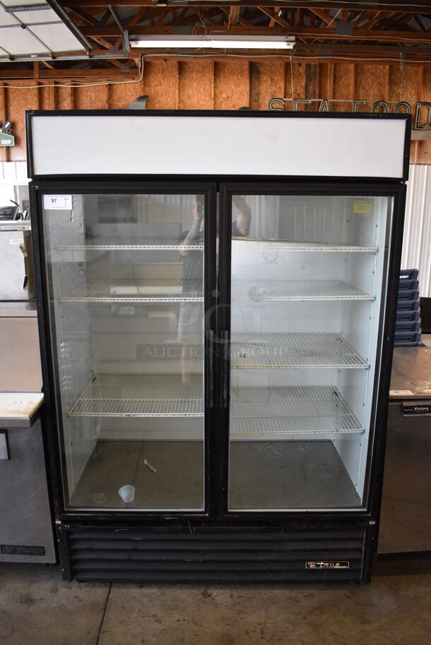 True Model GDM-49 Metal Commercial 2 Door Reach In Cooler Merchandiser w/ Poly Coated Racks. 115 Volts, 1 Phase. 54x30x79. Tested and Working!