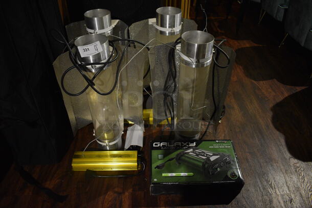 4 Light Fixtures w/ Amps. 15x8x27. 4 Times Your Bid! (lounge)