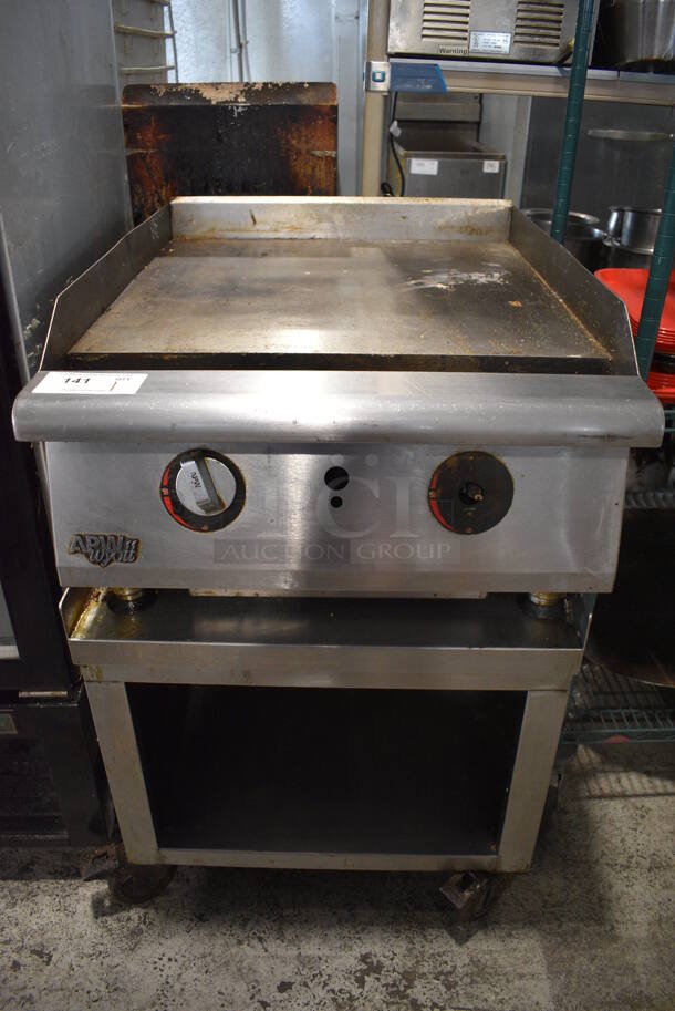 APW Wyott Stainless Steel Commercial Countertop Natural Gas Powered Flat Top Griddle on Stainless Steel Commercial Equipment Stand on Commercial Casters. 24x34x38 - Image 1 of 5