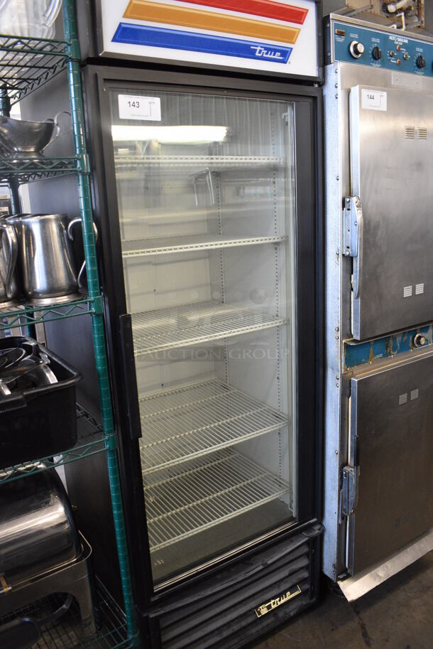 True GDM-19T Metal Commercial Single Door Reach In Cooler Merchandiser w/ Poly Coated Racks. 115 Volts, 1 Phase. 27x30x79. Tested and Powers On But Does Not Get Cold