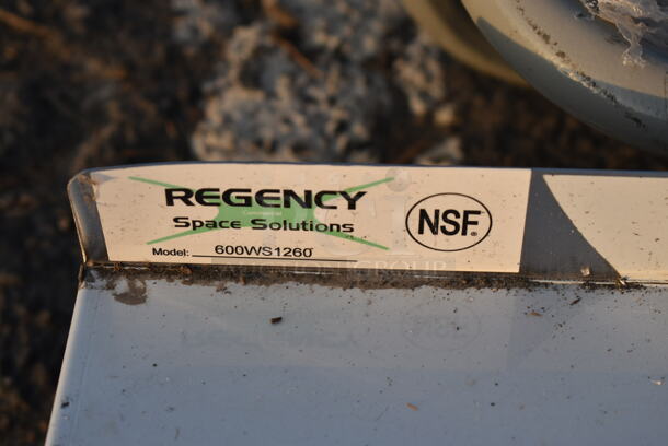 BRAND NEW SCRATCH AND DENT! Regency 600WS1260 18 Gauge Stainless Steel 12" x 60" Solid Wall Shelf - Image 3 of 3