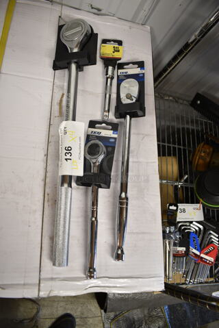4 BRAND NEW! TEQ Items; 2 Ratchet, Extension Bar and Round Head Ratchet. 4 Times Your Bid!