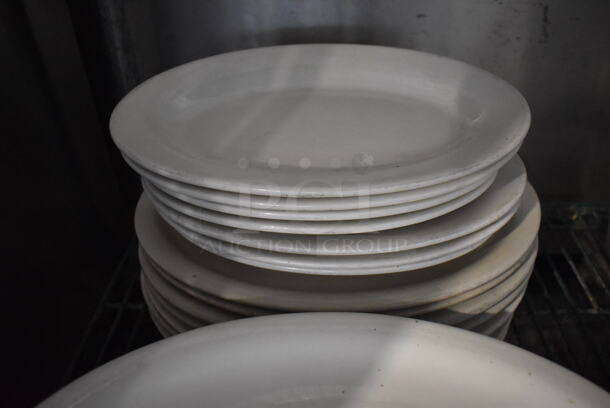 ALL ONE MONEY! Lot of 25 Various White Ceramic Oval Plates. Includes 13.5x11x1 - Image 2 of 3