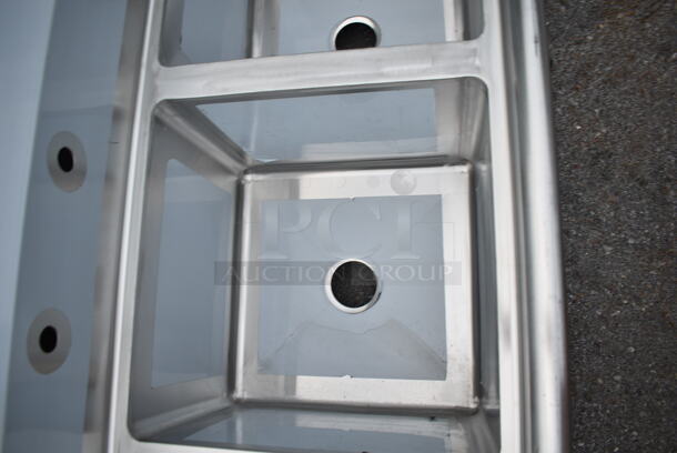 BRAND NEW SCRATCH AND DENT! Regency 600S31818 63" 16 Gauge Stainless Steel Three Compartment Commercial Sink with Stainless Steel Legs and Cross Bracing - 18" x 18" x 14" Bowls. No Legs.  - Image 5 of 7