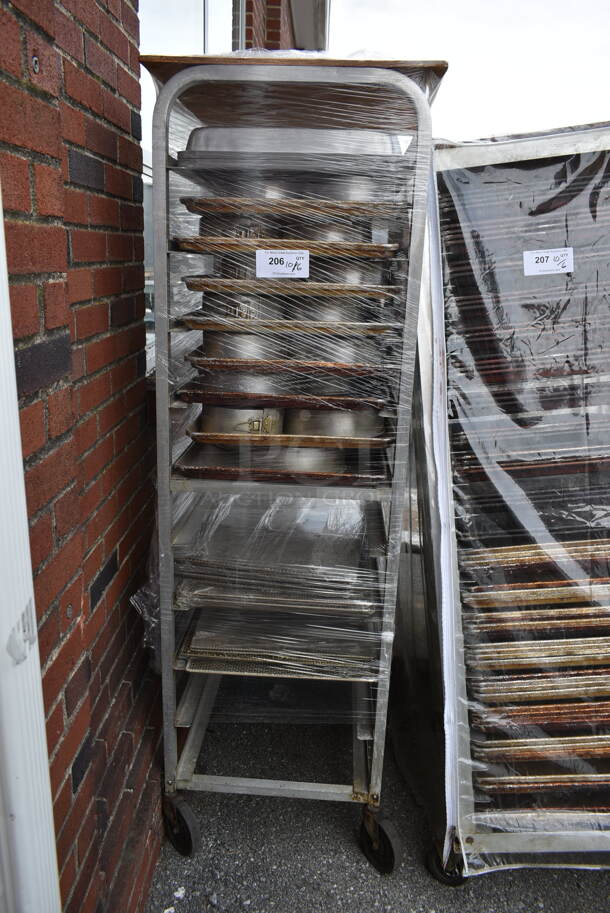 Metal Commercial Pan Transport Rack w/ 13 Metal Baking Pans on Commercial Casters.  - Image 1 of 4