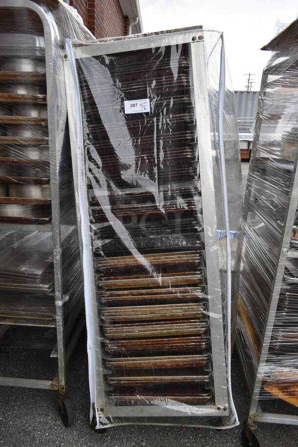 Metal Commercial Pan Transport Rack w/ 66 Metal Baking Pans and Clear Cover on Commercial Casters. Missing 1 Caster.