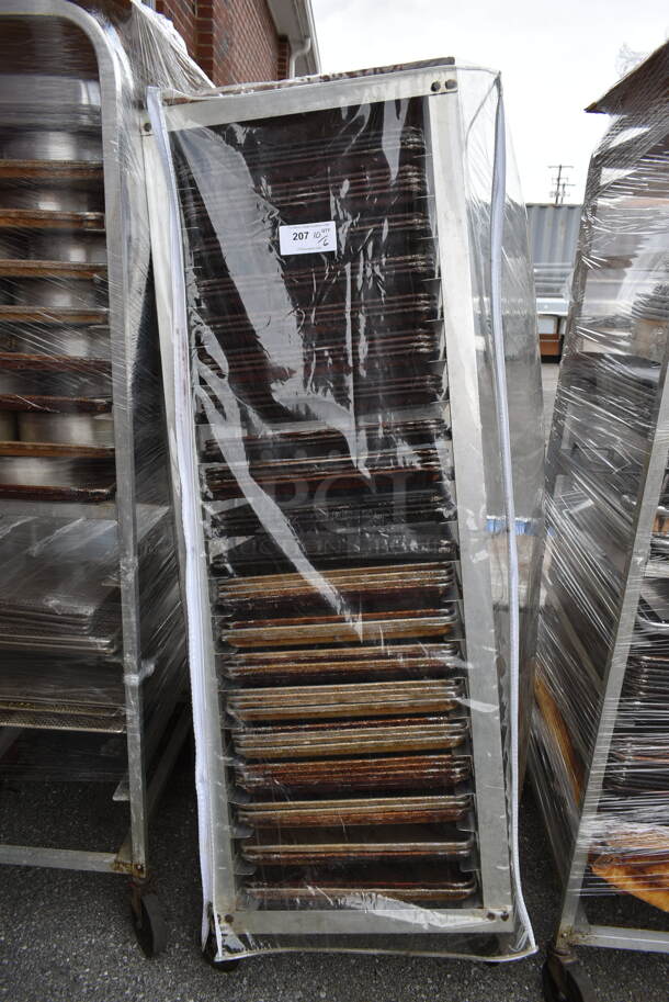 Metal Commercial Pan Transport Rack w/ 66 Metal Baking Pans and Clear Cover on Commercial Casters. Missing 1 Caster. - Image 1 of 5