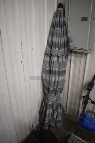 Gray and Blue Patio Umbrella and Black Metal Base. 18x18x14, 74"
