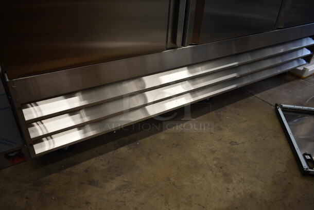 BRAND NEW SCRATCH AND DENT! 2023 Avantco 178SS3FHC Stainless Steel Commercial 3 Door Reach In Freezer w/ Poly Coated Racks on Commercial Casters. 115 Volts, 1 Phase. Tested and Working! - Image 4 of 11