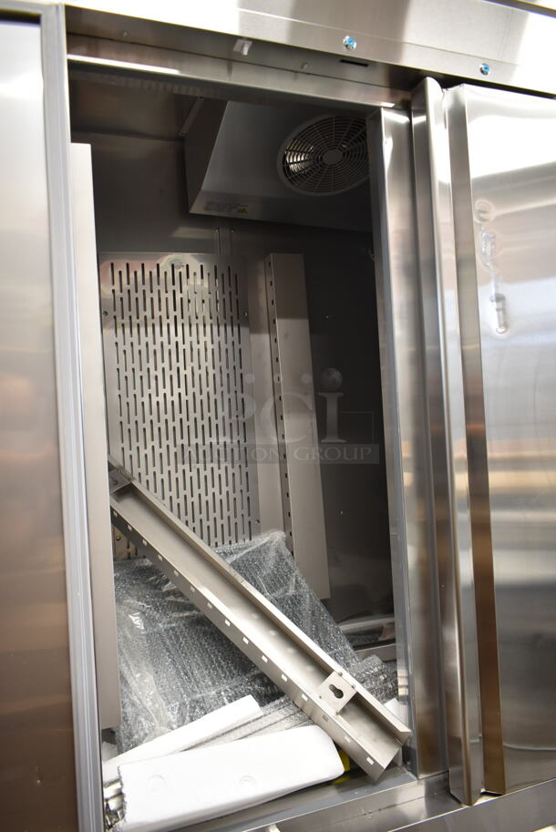 BRAND NEW SCRATCH AND DENT! 2023 Avantco 178SS3FHC Stainless Steel Commercial 3 Door Reach In Freezer w/ Poly Coated Racks on Commercial Casters. 115 Volts, 1 Phase. Tested and Working! - Image 6 of 11