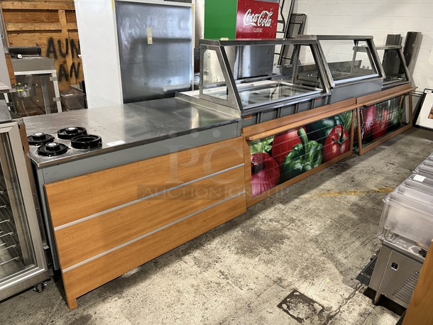 Duke Stainless Steel Commercial Subway Sandwich Make Line Prep Table w/ Lowering Sneeze Guard, In Counter Cup Dispensers and Front Panels. 231x38x58