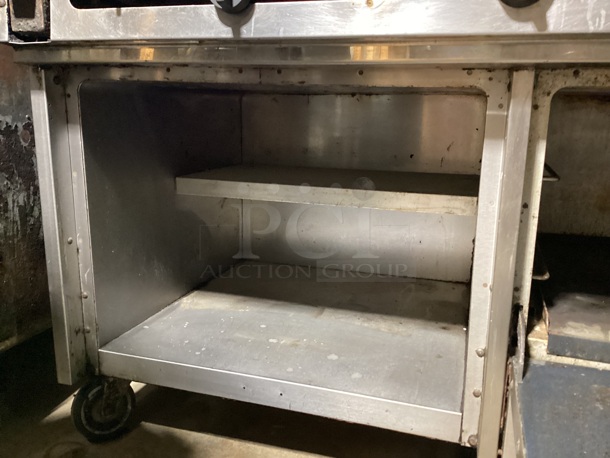 Stainless Steel 2-Burner Stove W/Flat Griddle, Single Oven, Under and Over Head Storage Shelves, on Castors. Not Tested, Natural Gas - Image 3 of 3