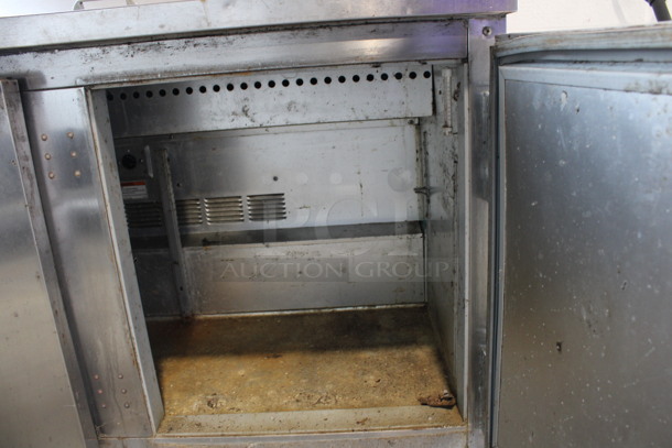 Beverage Air Model SP48-12 Stainless Steel Commercial Sandwich Salad Prep Table Bain Marie Mega Top on Commercial Casters. 115 Volts, 1 Phase. 48x30x41.5. Tested and Powers On But Does Not Get Cold - Image 6 of 8