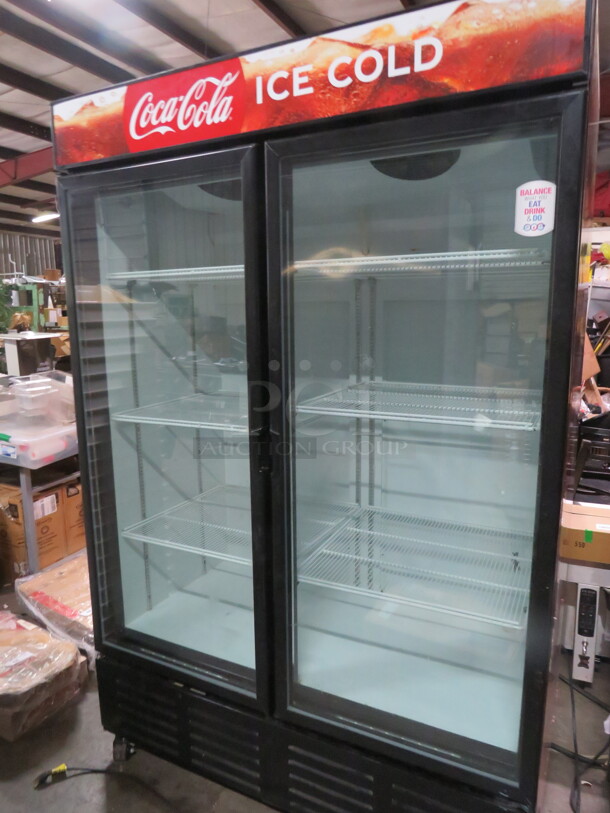 One Metalfrio 2 Door Glass Display Cooler With 6 Racks On Casters. WORKINH WHEN REMOVED. #NG49CHNC10. 54X29.5X82 - Image 2 of 4