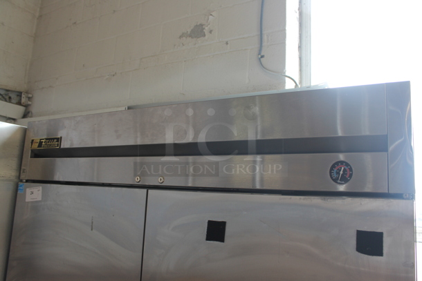 2013 True T-49F ENERGY STAR Stainless Steel Commercial Two Door Reach In Freezer w/ Poly Coated Racks on Commercial Casters. 115 Volts, 1 Phase. Tested and Working! - Image 2 of 9