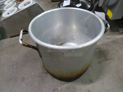 One 11 Inch Aluminum Stock Pot.