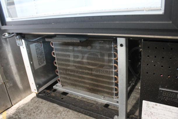 2016 True GDM-72F-HC-LD ENERGY STAR Metal Commercial 3 Door Reach In Freezer Merchandiser w/ Poly Coated Racks. 115/208-230 Volts, 1 Phase.  - Image 6 of 8