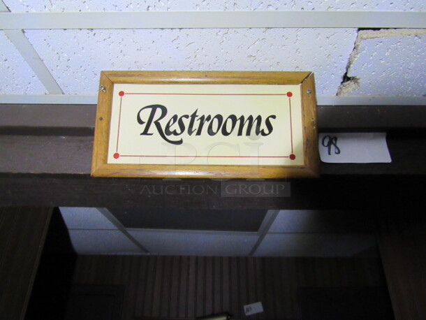 Wooden Sign. RESTROOMS. 12X6.5. BUYER MUST REMOVE.