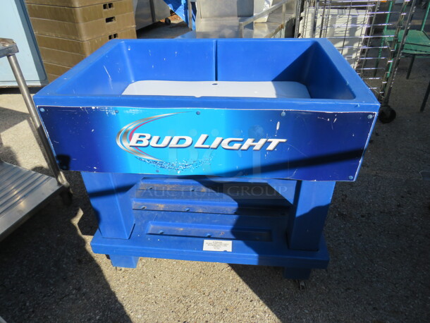 One Bud Light Beverage Transport Ice Down Merchandiser With Under Shelf On Casters. 35.5X24.5X33.5