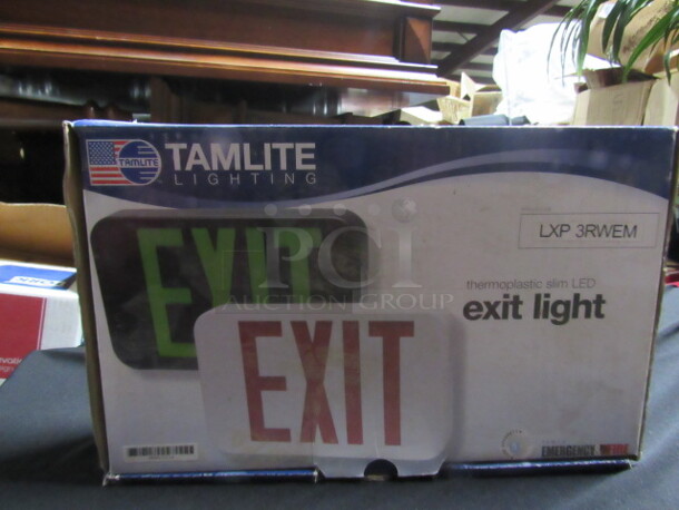 One NEW LED Exit Light. Model# LXP 3RWEM.
